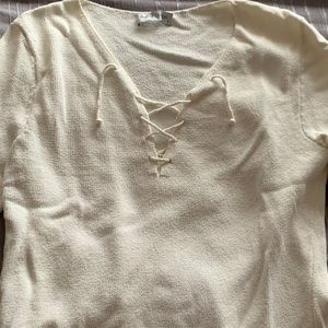 Ball of cotton lace up sweater